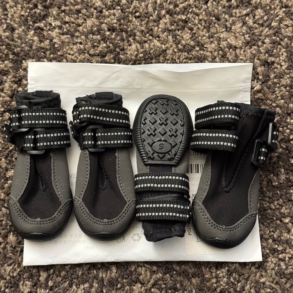 Never used weather dog boots. Small size